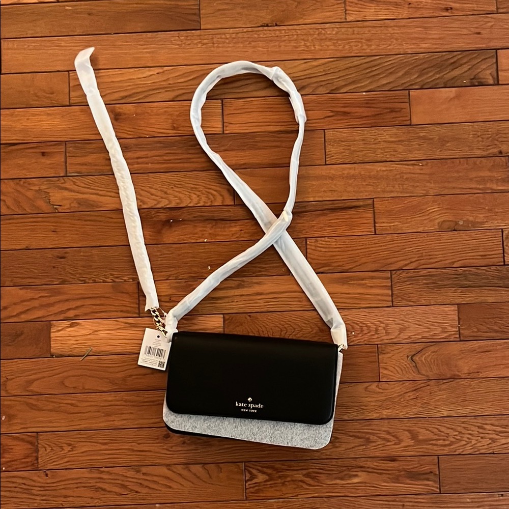 Kate Spade Black and Gold Crossbody Bag with Adjustable Strap and Compact Design